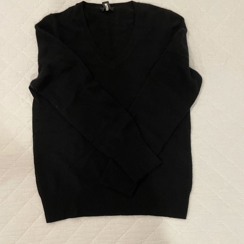 Black cashmere sweater.
